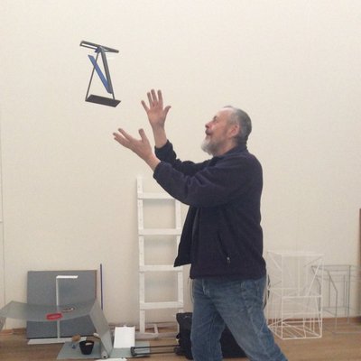 [Translate to English:] Kjell Varvin, preparing the exhibition at the Northern Norway Art Museum.